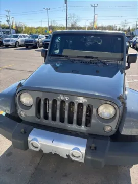 Photos of 2014 Jeep Wrangler Unlimited Sahara for sale in Davison, MI at Hank Graff Chevrolet Davison