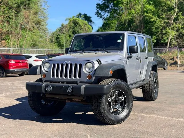 Silver 2013 Jeep Wrangler Unlimited Sport for sale in Davison, MI