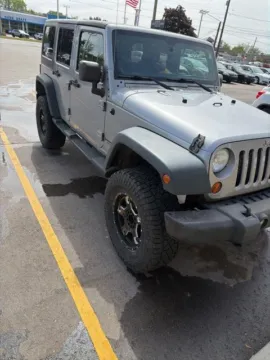 Silver 2013 Jeep Wrangler Unlimited Sport for sale in Davison, MI