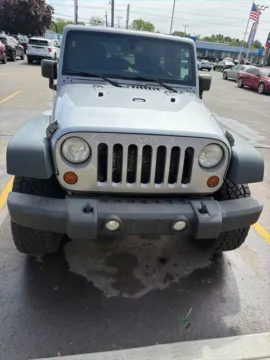 Photos of 2013 Jeep Wrangler Unlimited Sport for sale in Davison, MI at Hank Graff Chevrolet Davison