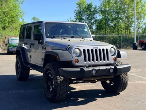 Another view of 2013 Jeep Wrangler Unlimited Sport for sale in Davison, MI at Hank Graff Chevrolet Davison