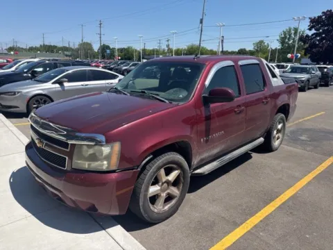 Red 2009 Chevrolet Avalanche 1500 LT for sale in Davison, MI