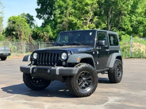 Black 2014 Jeep Wrangler Sport for sale in Davison, MI