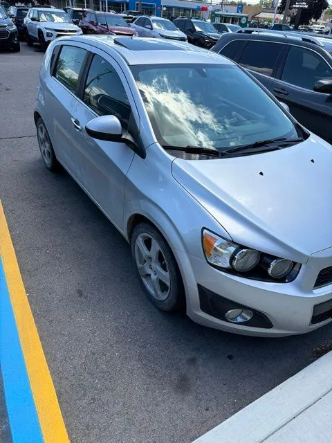 Silver 2014 Chevrolet Sonic LT for sale in Davison, MI