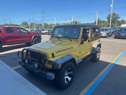 Yellow 2004 Jeep Wrangler Unlimited for sale in Davison, MI