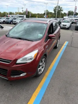 Orange 2015 Ford Escape Titanium for sale in Davison, MI
