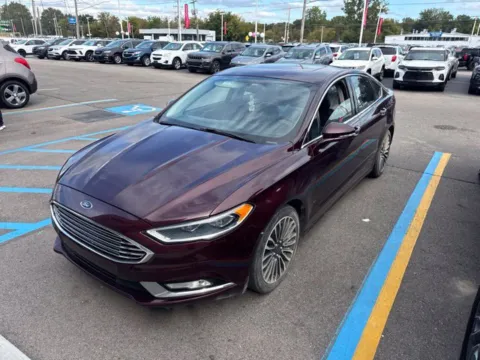 Red 2017 Ford Fusion SE for sale in Davison, MI