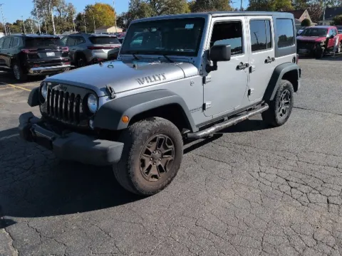 Silver 2016 Jeep Wrangler Unlimited Sport for sale in Davison, MI