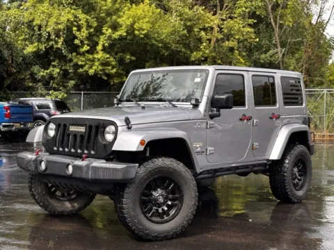 Silver 2015 Jeep Wrangler Unlimited Sahara for sale in Davison, MI