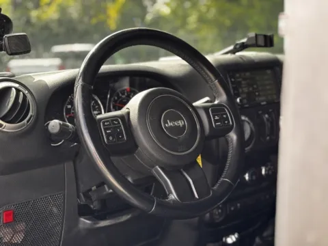 More photos of 2015 Jeep Wrangler Unlimited Sahara at Hank Graff Chevrolet Davison, MI