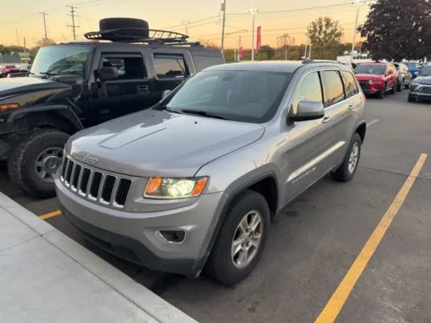 Silver 2016 Jeep Grand Cherokee Laredo for sale in Davison, MI