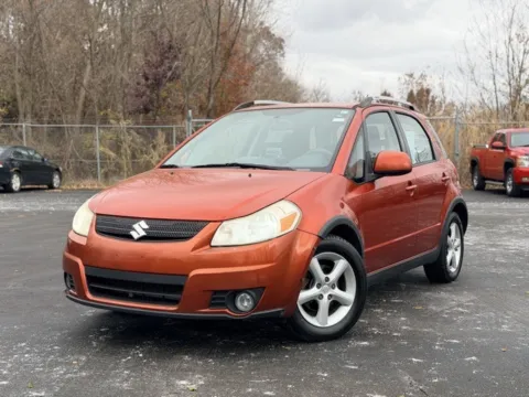Gray 2009 Suzuki SX4 Touring for sale in Davison, MI