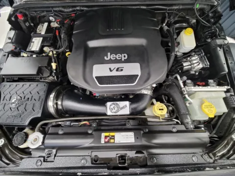 More photos of 2014 Jeep Wrangler Unlimited Sport at HyperCars, IN