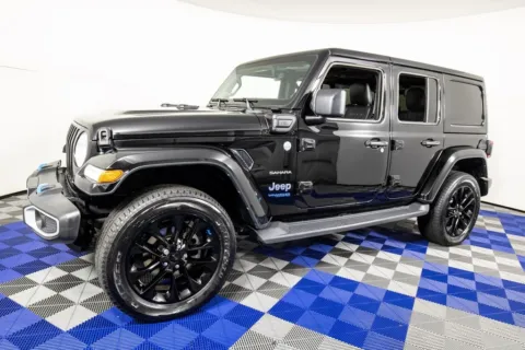 Black 2022 Jeep Wrangler Unlimited Sahara 4xe for sale in Austin, TX
