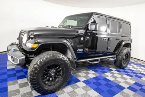 Black 2022 Jeep Wrangler Unlimited Sahara 4xe for sale in Austin, TX