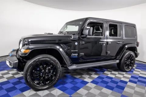 Black 2022 Jeep Wrangler Unlimited Sahara 4xe for sale in Austin, TX