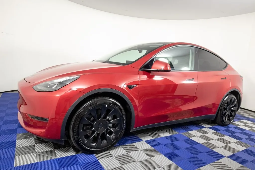 Red 2023 Tesla Model Y Long Range for sale in Austin, TX
