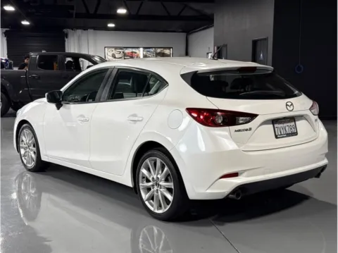 Another view of 2017 Mazda MAZDA3 Touring Hatchback 4D for sale in Garden Grove, CA at Quantum Auto Sales - Garden Grove