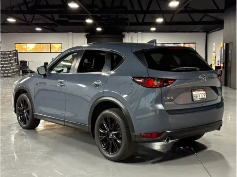 Another view of 2021 Mazda CX-5 Carbon Edition Turbo Sport Utility 4D for sale in Garden Grove, CA at Quantum Auto Sales - Garden Grove