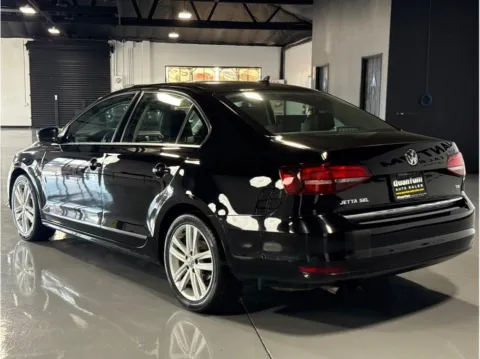 Another view of 2017 Volkswagen Jetta 1.8T SEL Sedan 4D for sale in Garden Grove, CA at Quantum Auto Sales - Garden Grove