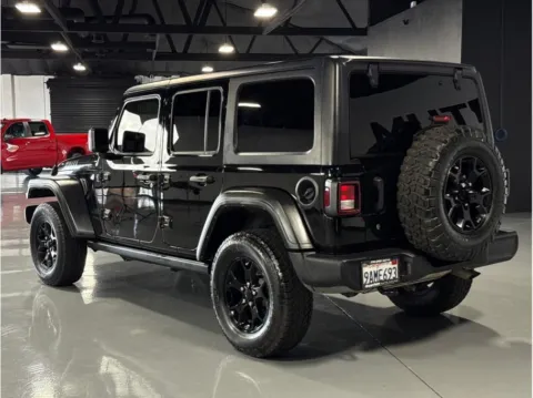 Another view of 2022 Jeep Wrangler Unlimited Willys Sport SUV 4D for sale in Garden Grove, CA at Quantum Auto Sales - Garden Grove