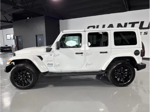 Photos of 2022 Jeep Wrangler Unlimited 4xe Sahara 4xe Sport Utility 4D for sale in Garden Grove, CA at Quantum Auto Sales - Garden Grove