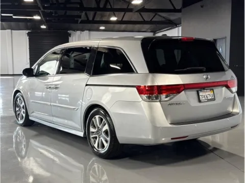 Another view of 2015 Honda Odyssey Touring Minivan 4D for sale in Garden Grove, CA at Quantum Auto Sales - Garden Grove