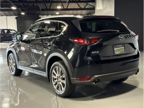 Another view of 2019 Mazda CX-5 Grand Touring Sport Utility 4D for sale in Garden Grove, CA at Quantum Auto Sales - Garden Grove