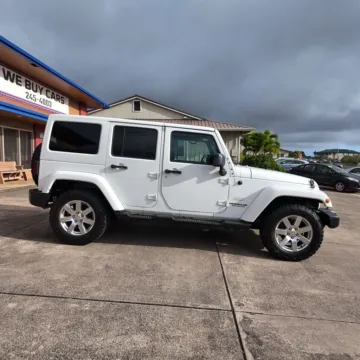 Photos of 2013 Jeep Wrangler Unlimited Sahara for sale in Lihue, HI at Ohana Motors