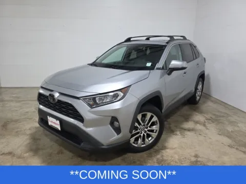Silver 2021 Toyota RAV4 XLE Premium for sale in Wentzville, MO