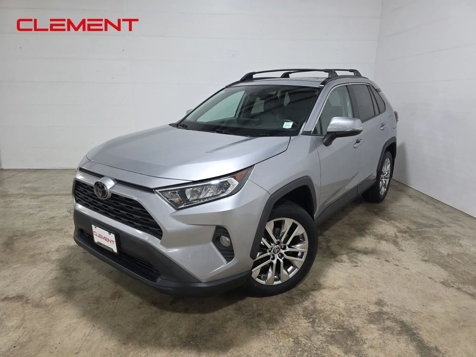 Silver 2021 Toyota RAV4 XLE Premium for sale in Wentzville, MO