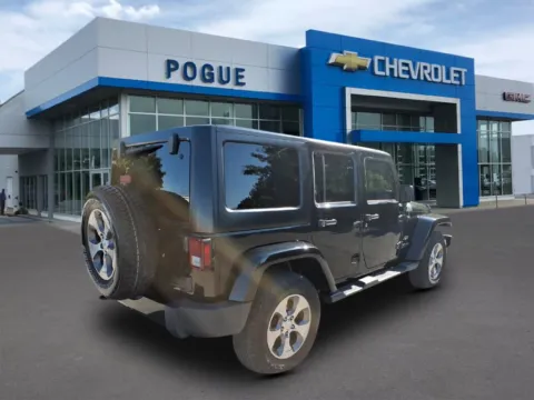Photos of 2018 Jeep Wrangler JK Unlimited Sahara for sale in Powderly, KY at Pogue Chevrolet, INC.