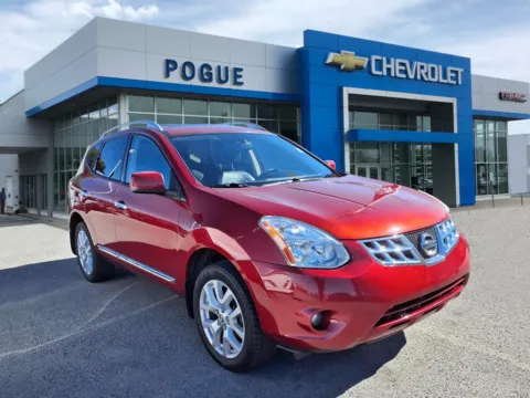 Red 2011 Nissan Rogue SV for sale in Powderly, KY