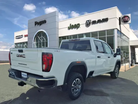 Photos of 2024 GMC Sierra 2500HD Pro for sale in Powderly, KY at Pogue Chrysler Dodge Jeep RAM FIAT