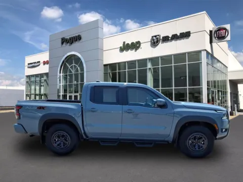 Photos of 2025 Nissan Frontier PRO-4X for sale in Powderly, KY at Pogue Chrysler Dodge Jeep RAM FIAT