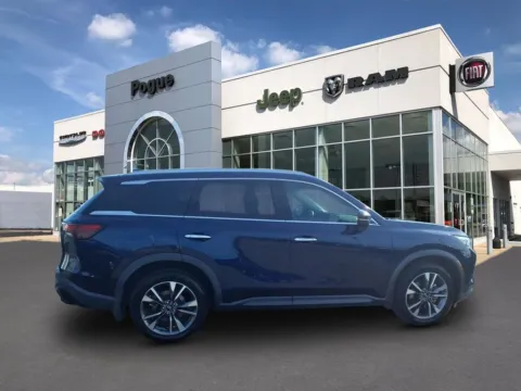 Photos of 2023 INFINITI QX60 LUXE for sale in Powderly, KY at Pogue Chrysler Dodge Jeep RAM FIAT