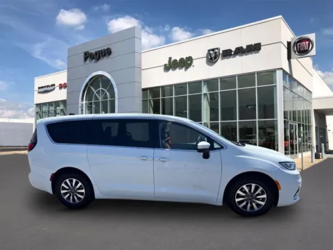 Photos of 2023 Chrysler Pacifica Hybrid Touring L for sale in Powderly, KY at Pogue Chrysler Dodge Jeep RAM FIAT
