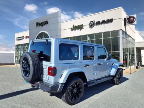 Photos of 2024 Jeep Wrangler Sahara 4xe for sale in Powderly, KY at Pogue Chrysler Dodge Jeep RAM FIAT