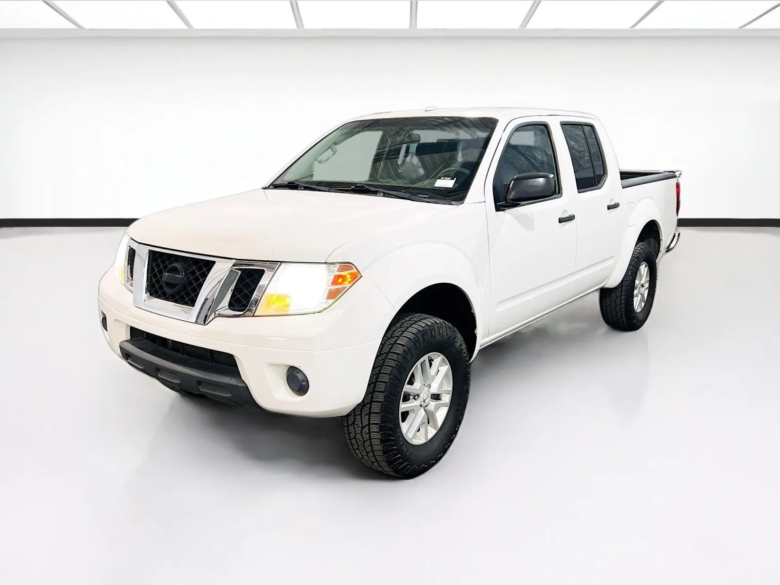 2016 Nissan Frontier 4.0 SV Crew Cab 4X4 AT SWB's photo