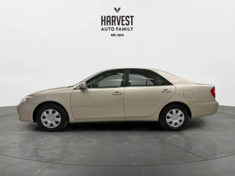 Photos of 2004 Toyota Camry LE Sedan 4D for sale in Wahoo, NE at Harvest Auto Family