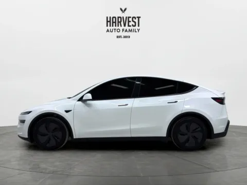 Photos of 2026 Tesla Model Y Long Range Sport Utility 4D for sale in Wahoo, NE at Harvest Auto Family