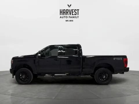 Photos of 2021 Ford F350 Super Duty Crew Cab Lariat Pickup 4D 6 3/4 ft for sale in Wahoo, NE at Harvest Auto Family