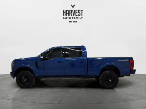 Photos of 2022 Ford F250 Super Duty Crew Cab Lariat Pickup 4D 6 3/4 ft for sale in Wahoo, NE at Harvest Auto Family