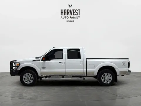 Photos of 2013 Ford F250 Super Duty Crew Cab Lariat Pickup 4D 6 3/4 ft for sale in Wahoo, NE at Harvest Auto Family