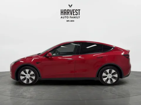 Photos of 2023 Tesla Model Y Long Range Sport Utility 4D for sale in Wahoo, NE at Harvest Auto Family