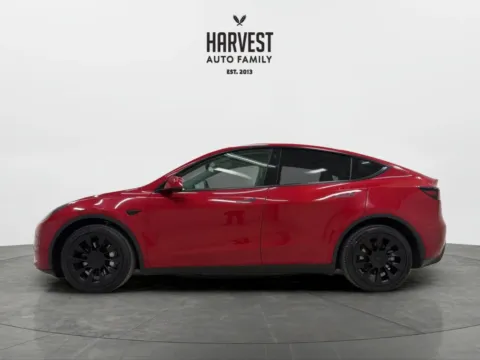 Photos of 2023 Tesla Model Y Long Range Sport Utility 4D for sale in Wahoo, NE at Harvest Auto Family