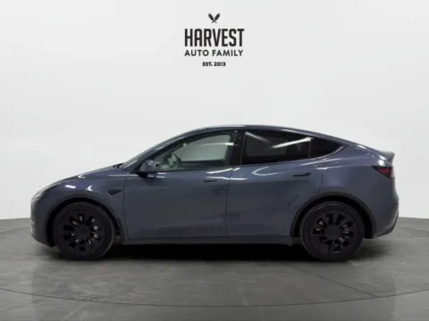 Photos of 2023 Tesla Model Y Long Range Sport Utility 4D for sale in Wahoo, NE at Harvest Auto Family