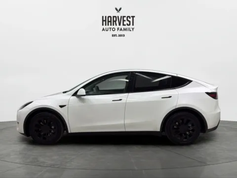 Photos of 2024 Tesla Model Y Long Range Sport Utility 4D for sale in Wahoo, NE at Harvest Auto Family
