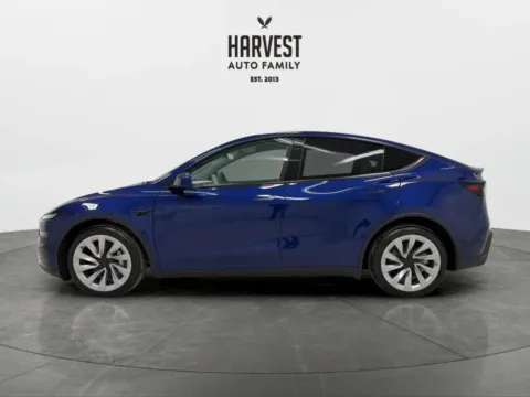 Photos of 2026 Tesla Model Y Standard Sport Utility 4D for sale in Wahoo, NE at Harvest Auto Family