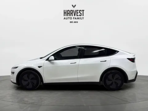 Photos of 2026 Tesla Model Y Standard Sport Utility 4D for sale in Wahoo, NE at Harvest Auto Family